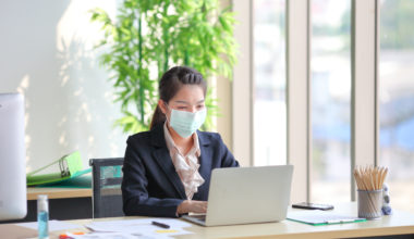 female-employee-wearing-medical-facial-mask-1